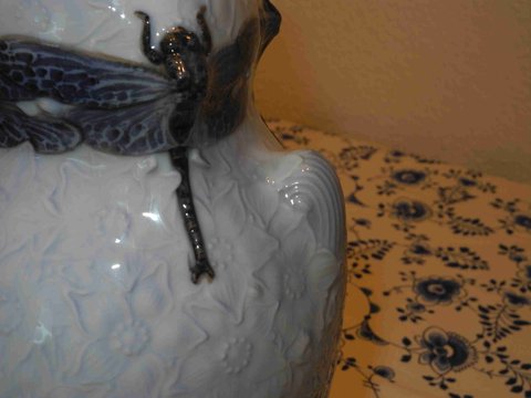 Dragonfly and flower vase