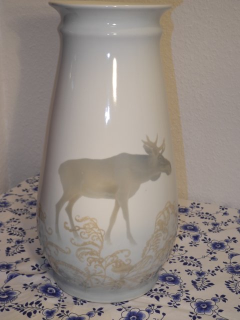 Elk with fern and mushroom vase