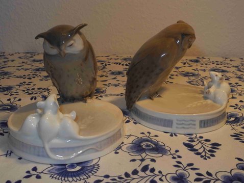 Owl with mice on podest